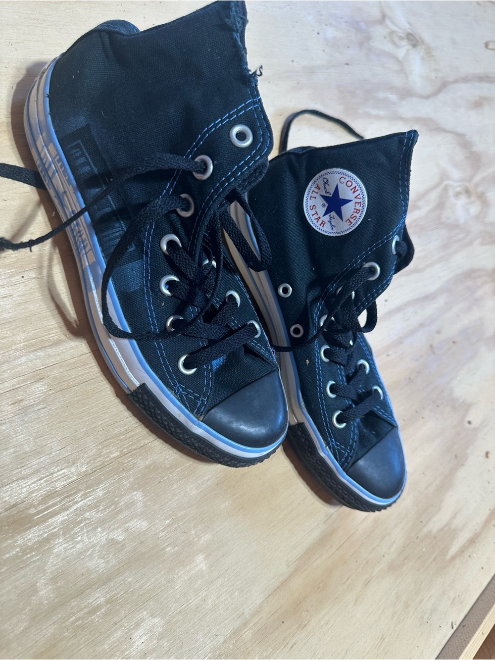 Converse men’s size 4 or youth 4 Black High-Top Canvas Sneakers